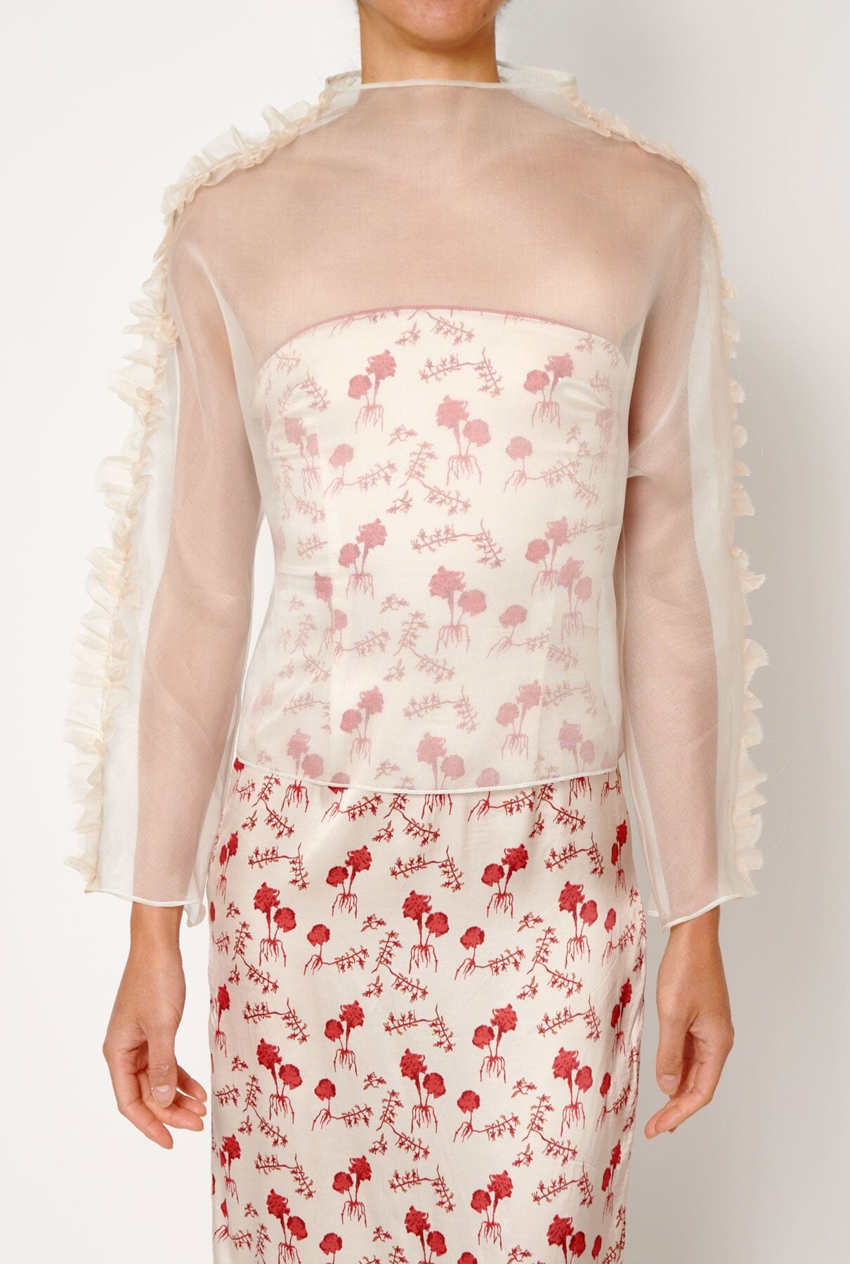 Blusa con tira plisada