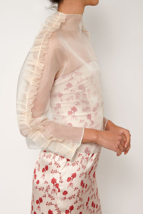 Blusa con tira plisada