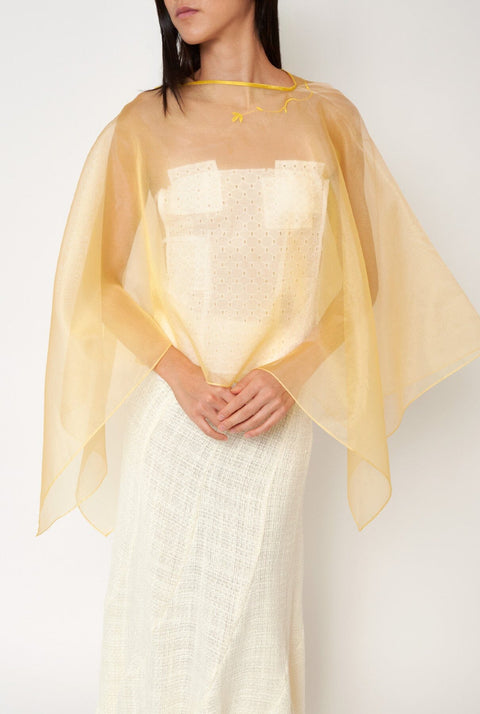 Capa de organza amarilla